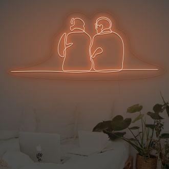 Couple Sitting Together Neon Sign