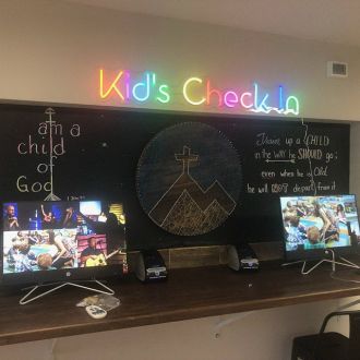 Kids Check In Neon Sign
