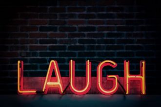 Laugh Neon Sign