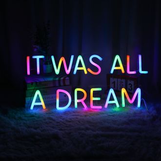 The neon sign features a rainbow of colors, spelling out the phrase "It Was All A Dream" in bold letters. The sign gives off a vibrant, electrifying glow, adding a playful touch to any room. Perfect for a bedroom, office, or living space, this neon sign s